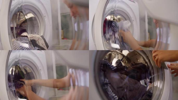 女人给洗衣机灌水把衣服放进烘干机外国人视