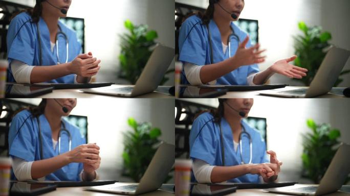 女医生在网上诊所的笔记本电脑工作现场谈话，帮助患者在远程医疗咨询VoIP服务应用程序。
