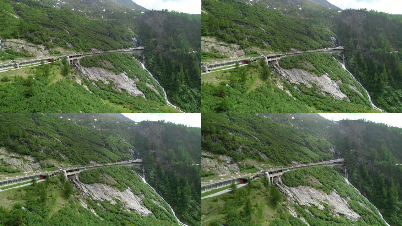 空中: 瑞士山区Simplon pass的电影无人机视图