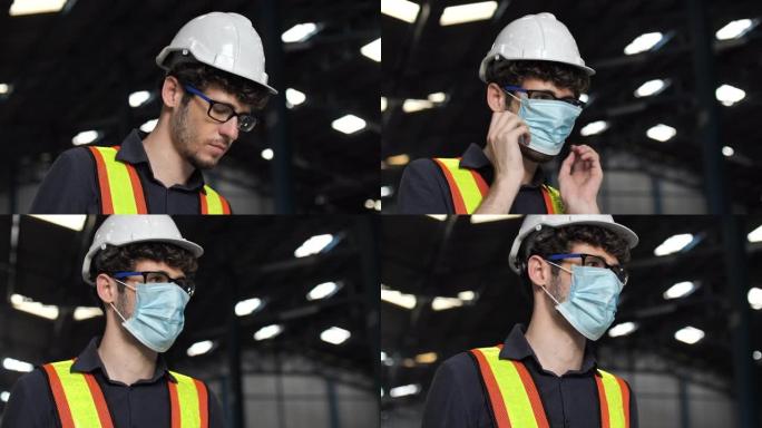 自信的年轻工业工人肖像，戴着口罩