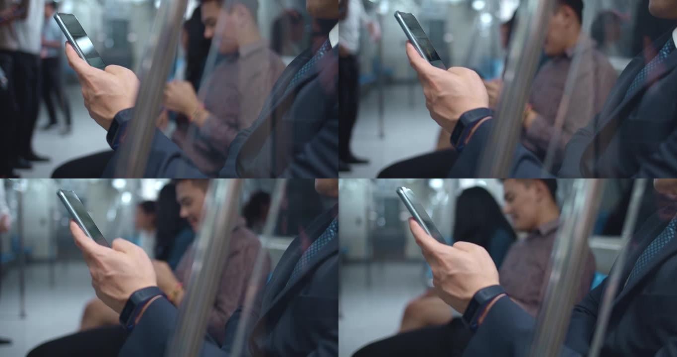 在地铁期间使用智能手机的商人，特写镜头