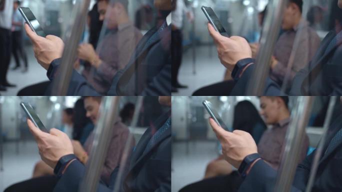 在地铁期间使用智能手机的商人，特写镜头