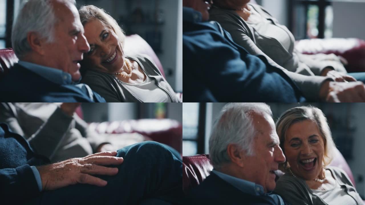 一对可爱的高级夫妇的特写镜头在家里的沙发上牵着彼此的手，深情地表示永远的爱和尊重。