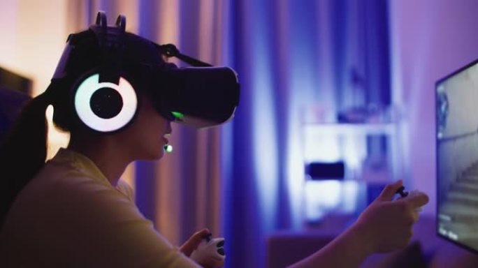 女人玩虚拟现实游戏元宇宙数字世界技术增强现实控制