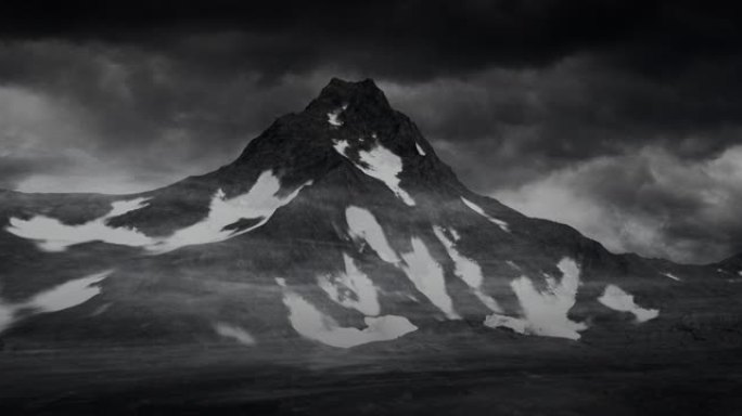 一座巨大的雪山的黑白景观，山峰陡峭。大黑山上风景的戏剧性景色。