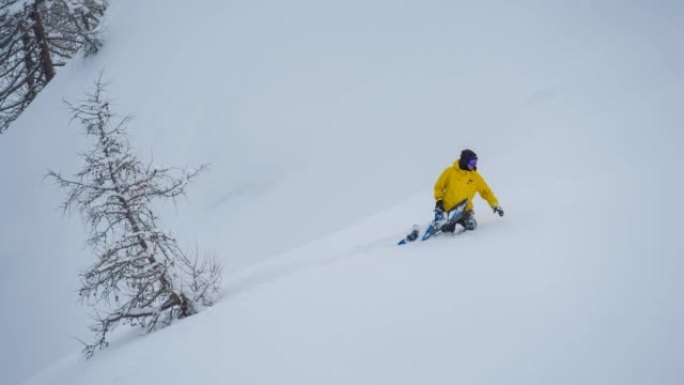 滑雪者在偏远地区探索雪山