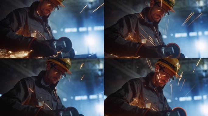 重工业工程工厂内部与工业工人使用角磨机和切割金属管。安全制服和安全帽制造金属结构的承包商。