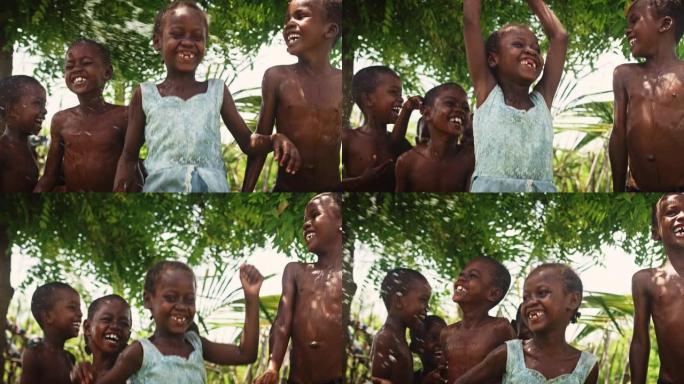 一群非洲孩子，在农村嬉笑嬉水。黑人孩子享受和欣赏水的礼物。获得清洁水源的人权概念
