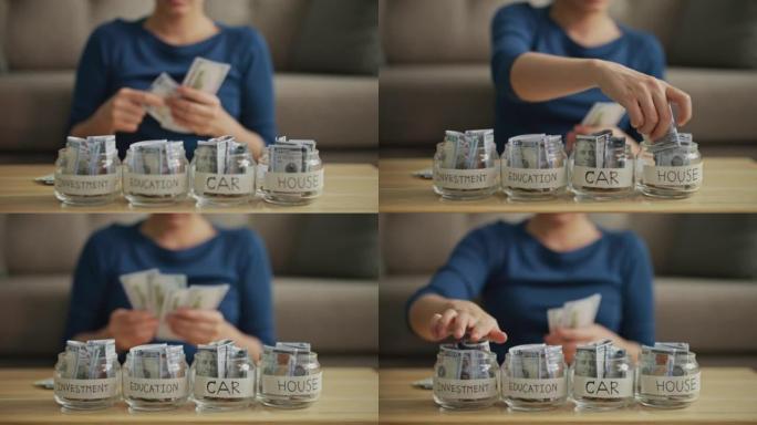 计划投资资金女人在存钱的罐子装满硬币