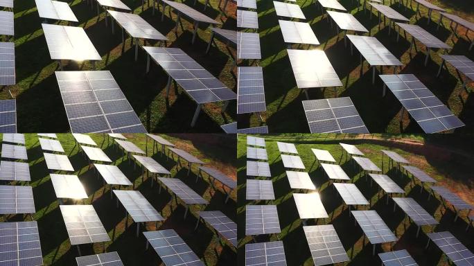 早晨，一架无人机正在通过太阳能电池飞行，阳光反射在其身上。太阳能电池用于涉及替代能源的应用中。利用太