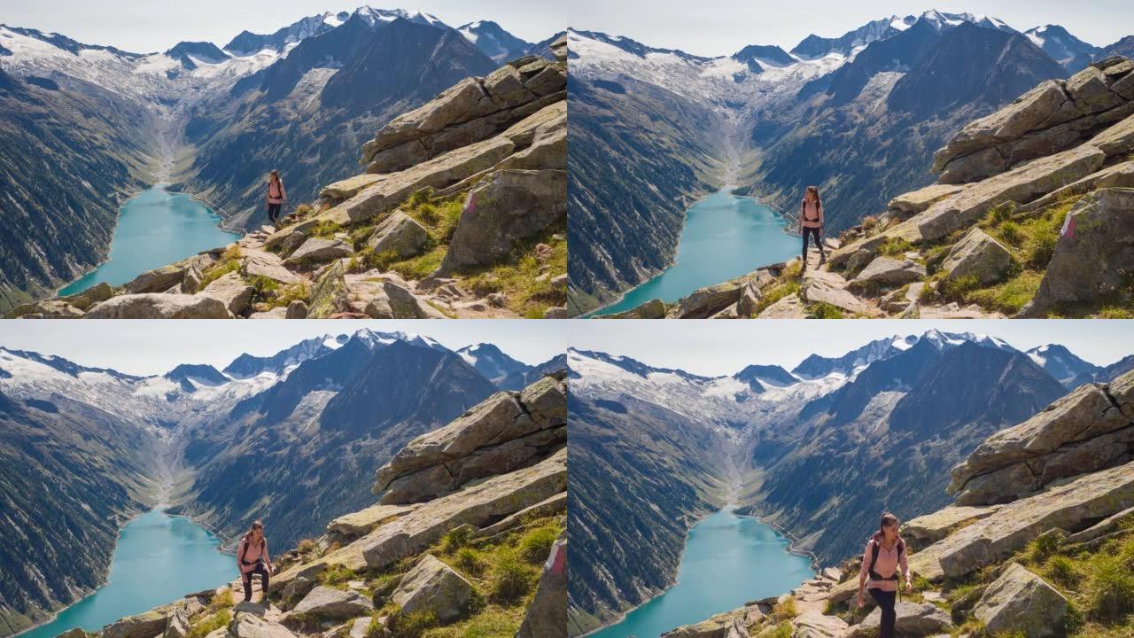 身体意识强的女运动员在风景如画的山区自然户外徒步旅行