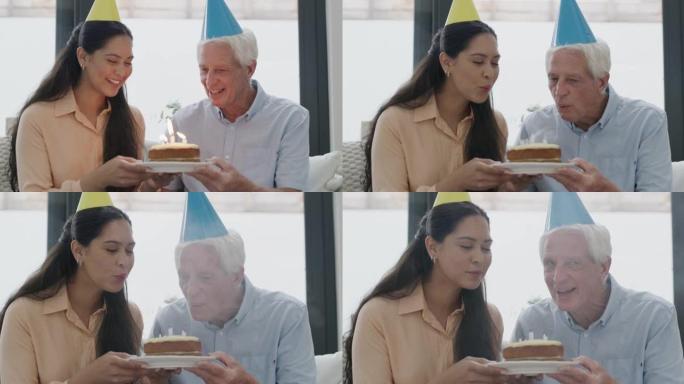一个成熟男人在生日蛋糕上吹蜡烛的4k视频片段