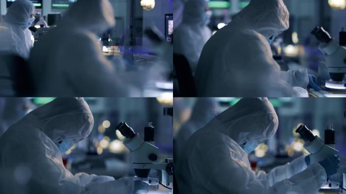 科学家在实验室工作时穿着辐射服的4k录像