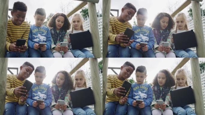 一群年轻朋友在外面使用电子设备的4k视频片段