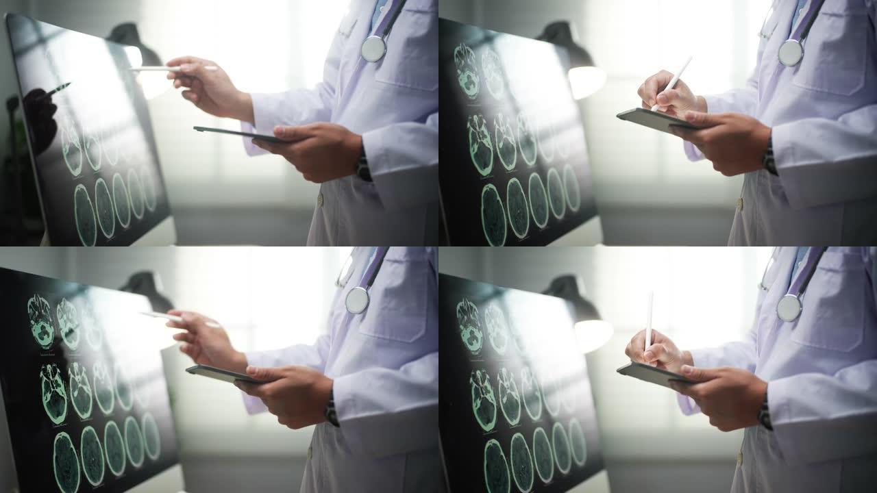使用数字平板电脑的医生的特写手