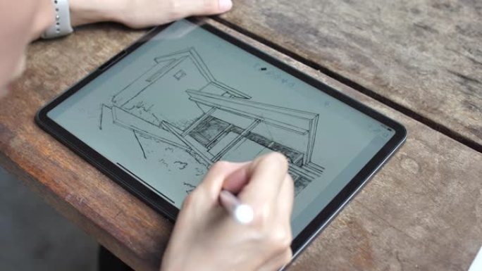 建筑师在数字平板电脑上绘制草图
