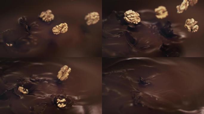 核桃在4k超慢动作中溅到液态黑巧克力中