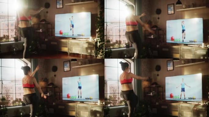家庭健身房: 通过在线视频教程与私人教练一起训练美丽的超大身材积极的女孩。真正的女人跳跃。健身服务健