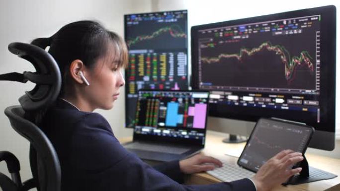 女商人看股票数字股市金融屏幕数据
