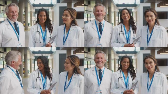 医务人员穿着白色大褂和数字平板电脑在医院开会的肖像
