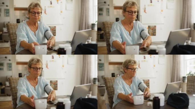 使用血压计的高级妇女