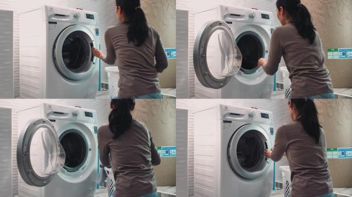 女人在家洗衣服女人在家洗衣服洗衣机智慧智