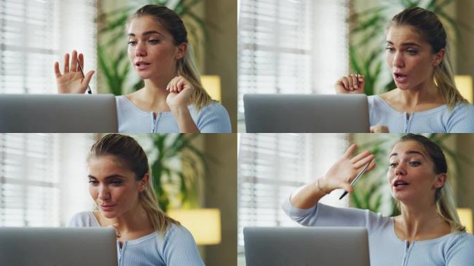 年轻女子的真实镜头正在用笔记本电脑与同事进行视频电话会议，同时在家里的客厅里工作。概念: 智能工作，
