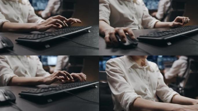 女人的手在键盘上打字的特写