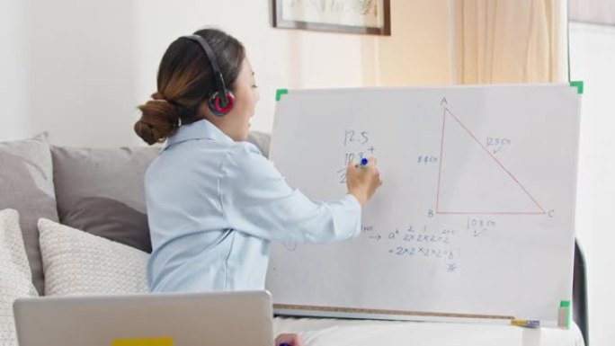 美丽的亚洲女人在线教数学，家庭教育概念股