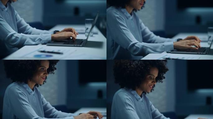深夜在大城市办公室工作的非裔美国女商人的特写镜头。管理数字电子商务项目，财务分析的女执行董事。