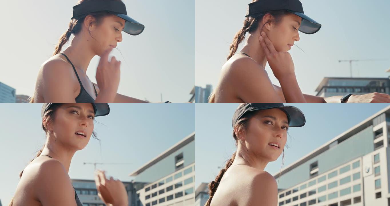 4k视频片段，一名妇女在跑步后检查自己的脉搏