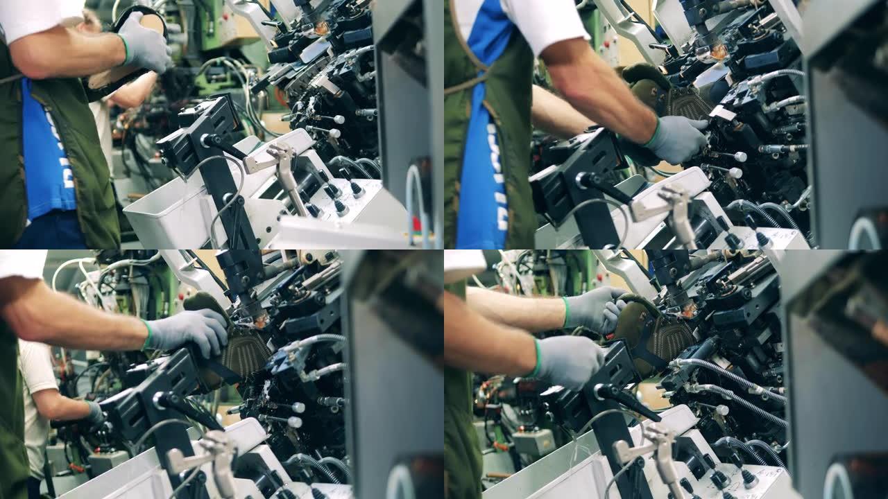 工人将鞋底放入靴子中并进行机械调整