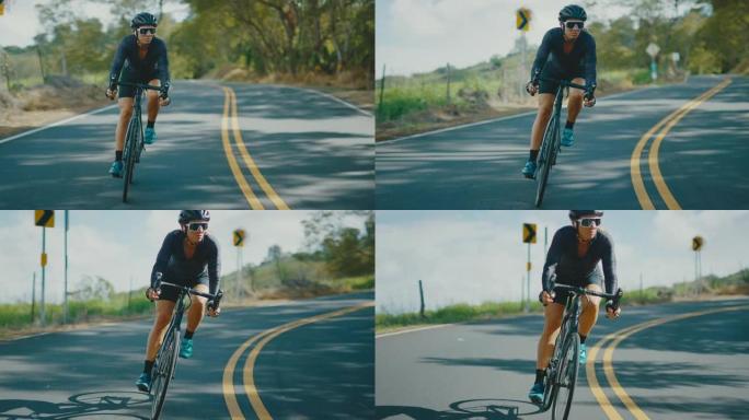 骑自行车的人骑在乡村公路上