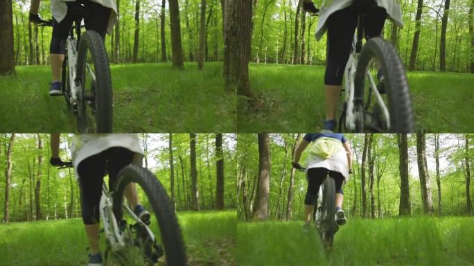 SLO MO女人骑着山地自行车穿过森林中的林间空地