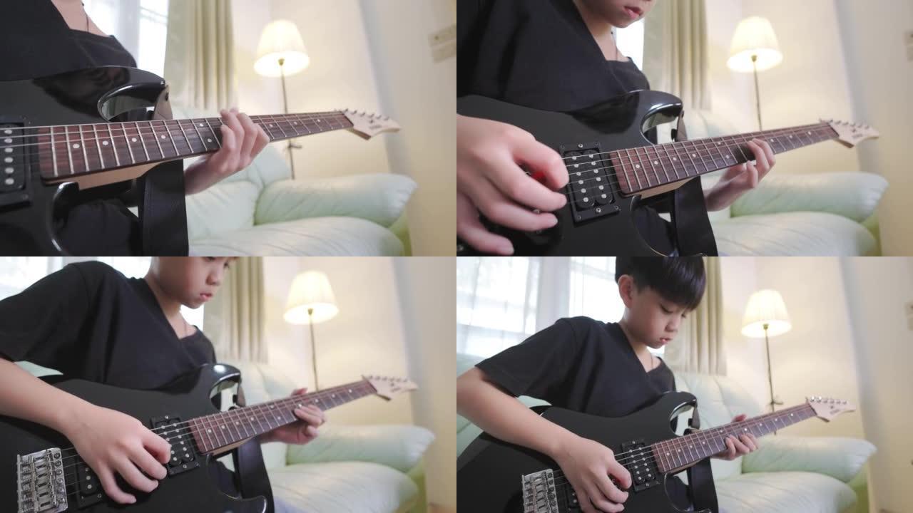 玩电吉他的亚洲男孩