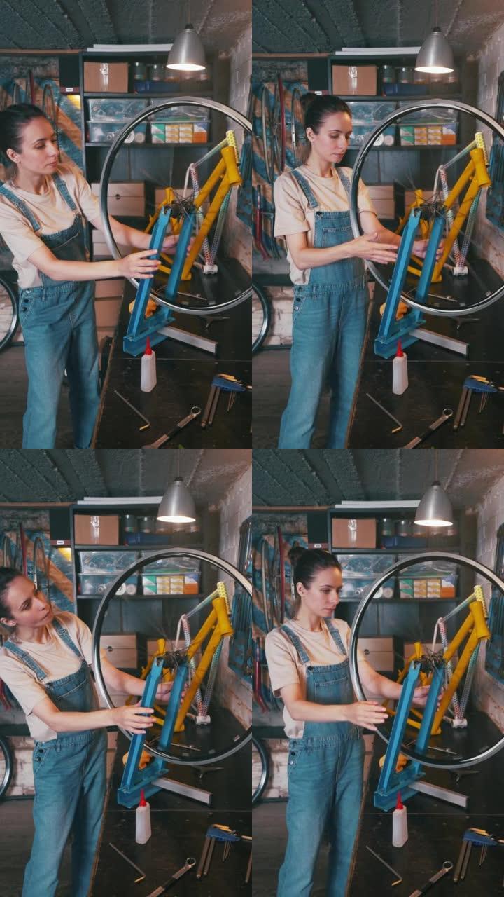 她正在车间修理自行车车轮。
