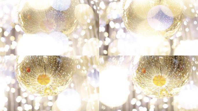 庆祝圣诞节的金球视觉创意视频素材光斑