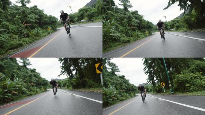 亚洲男子骑自行车的人骑公路自行车。
