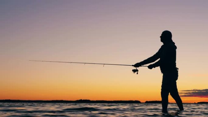 日落湖和一个渔夫投了一根钓鱼竿