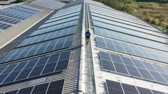 无人机查看亚洲工程师服务和检查太阳能电池