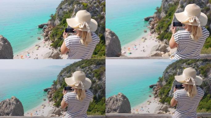 一个金发女人在海滩上拍照的景色，撒丁岛。