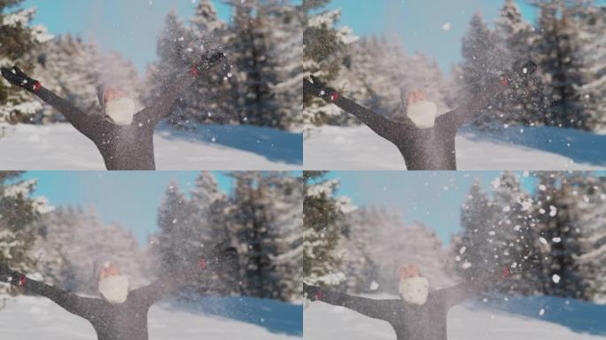 特写: 年轻女子在白雪皑皑的乡村玩雪玩得很开心。