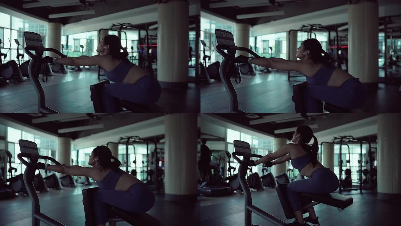 亚洲妇女在健身房锻炼