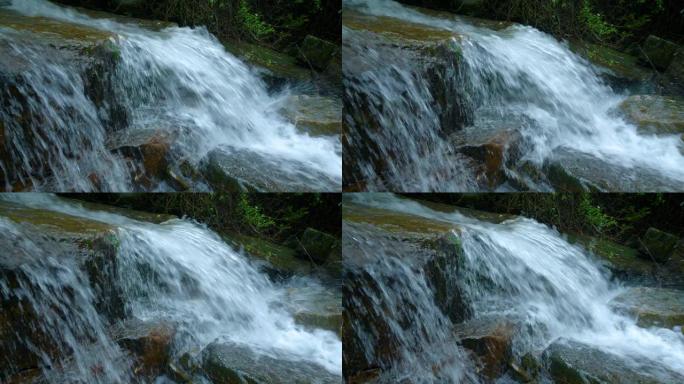 溪流落在岩石上森林海氧吧瀑布溪流水
