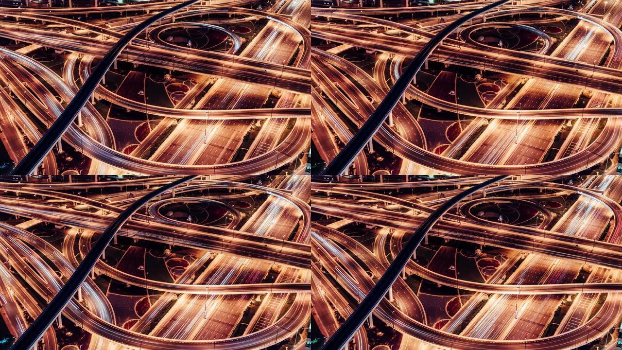 阿联酋迪拜夜间立交桥、地铁和城市交通的T/L鸟瞰图