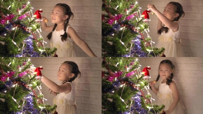 快乐的亚洲小女孩在圣诞节跳舞