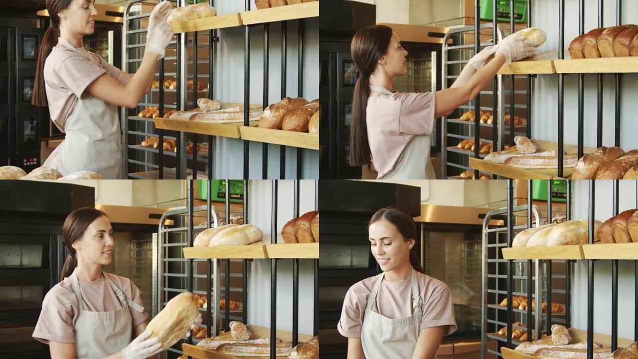 面包店工人将面包放在架子上出售