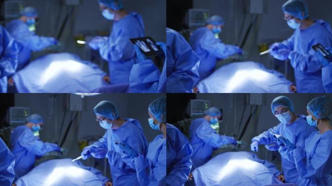 手术过程中使用平板电脑佩戴口罩和防护服的外科医生群体多样化