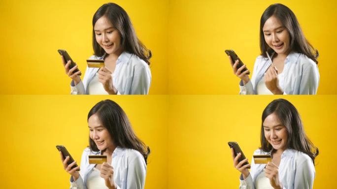 女人在网上使用黄色背景的电话购物