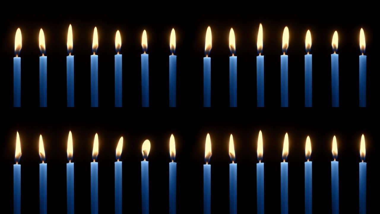 蓝色蜡烛在黑暗中燃烧
